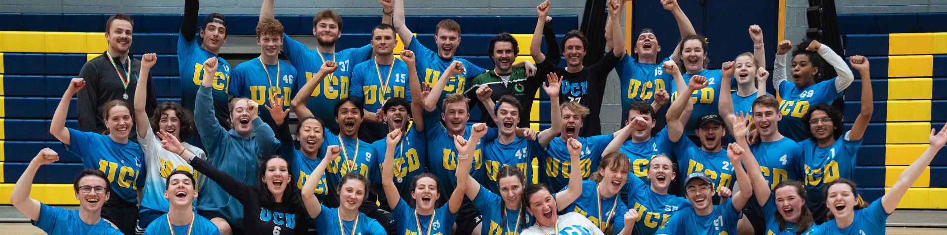 Members of UCD Men's Boat Club in the river Liffey during Colours 2023